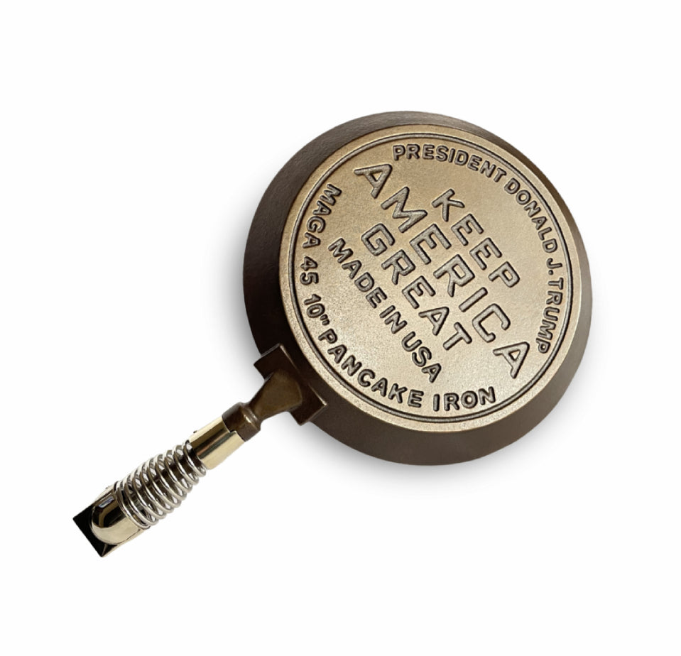 MAGA PANCAKES commemorative hand-finished and pre-seasoned cast iron pancake skillet, MAGAPAN, bottom reads; President Donald J. Trump; Keep America Great, Made In USA, MAGA 45 10" Pancake Iron.