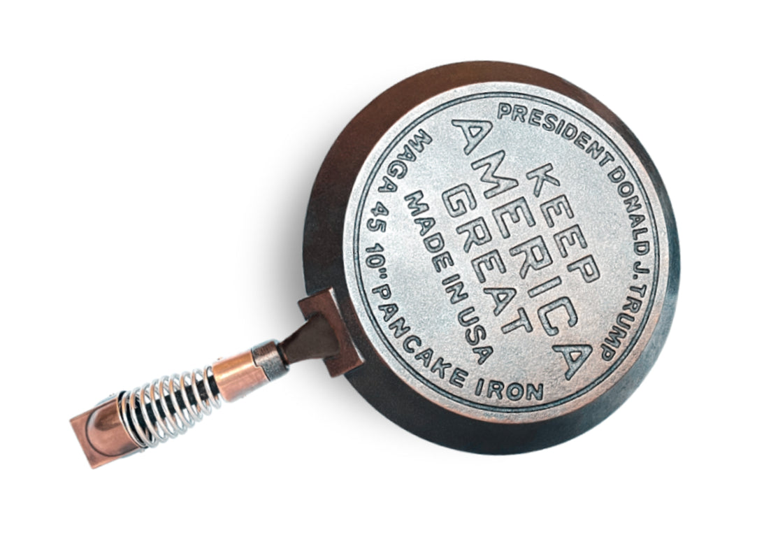 MAGA PANCAKES commemorative hand-finished and pre-seasoned cast iron pancake skillet, MAGAPAN back reads; President Donald J. Trump; Keep America Great, Make In USA, MAGA 45 10" Pancake Iron.